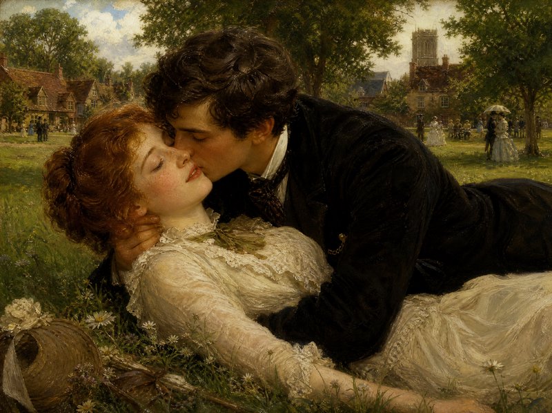 Victorian couple sharing a tender kiss reclining on grass in a sunlit village park