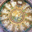 Circular gold mosaic dome with intricate religious figures and radiant sunburst in a grand cathed...