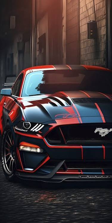 Front close-up of a glossy black and red striped custom Ford Mustang parked in a moody urban alley