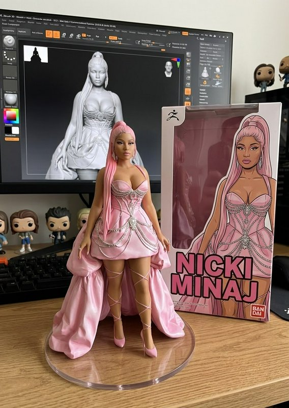 Finished custom Nicki Minaj action figure on a clear stand, next to its collector box, with its 3...