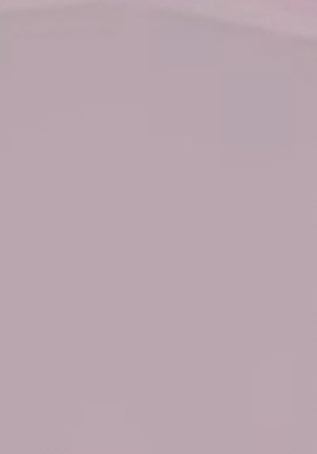 Smooth muted dusty lavender plain background with faint soft gradient along the top edge