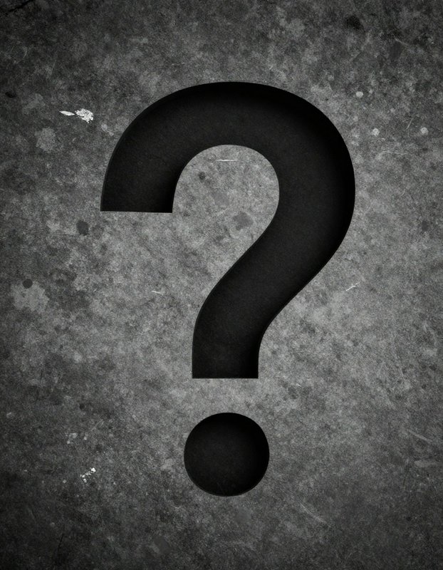 [Recessed black question mark centered on a rough, weathered grey grunge concrete surface]
