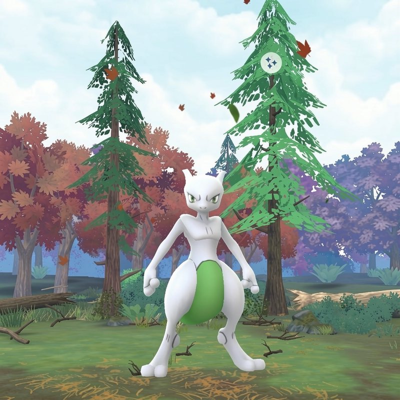 Shiny Mewtwo with a bright green belly stands in a stylized autumn forest Pokemon game environment.