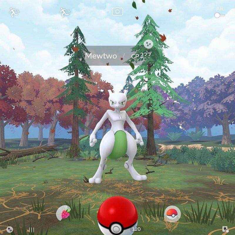 Pokemon Go in-game encounter screen showing a shiny Mewtwo standing in a colorful autumn forest h...