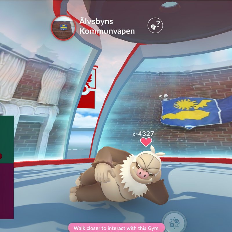 High CP Slaking lounging inside a Pokemon Go gym at the Älvsbyns Kommunvapen location