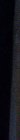 Blurred dark vertical digital glitch artifact with faint muted color strip along one edge