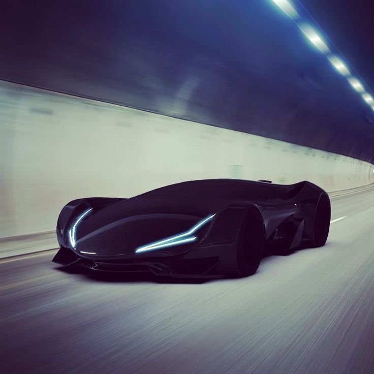 Sleek black futuristic concept supercar speeds through an illuminated concrete road tunnel.