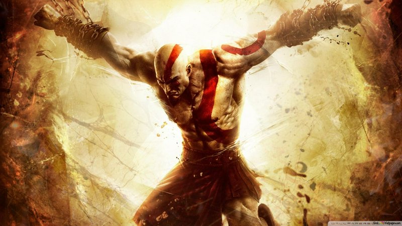 Kratos from God of War strains with outstretched chained arms against a glowing textured golden b...