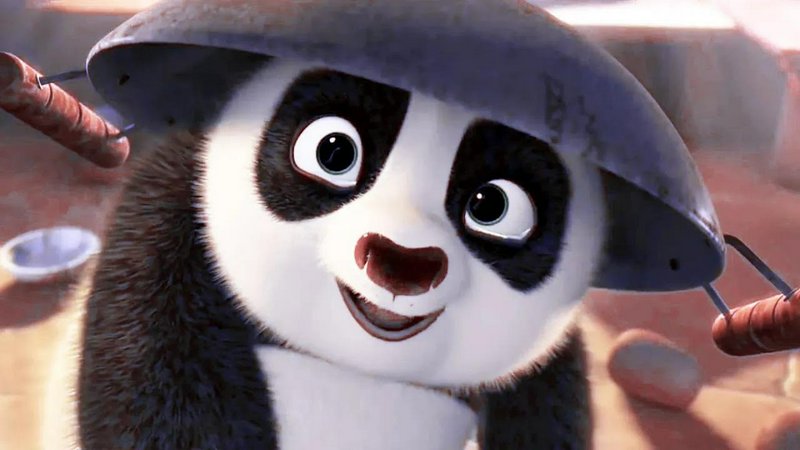 Close up of Po from Kung Fu Panda smiling while wearing a wide metal warrior hat