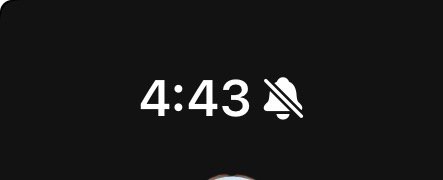 White bold 4:43 digital time next to a muted silent bell icon on a solid black smartphone screen