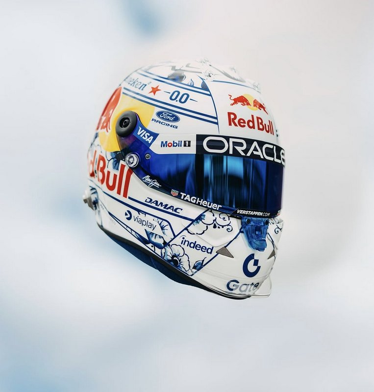 Special edition Max Verstappen Oracle Red Bull F1 racing helmet with Delft blue livery against so...