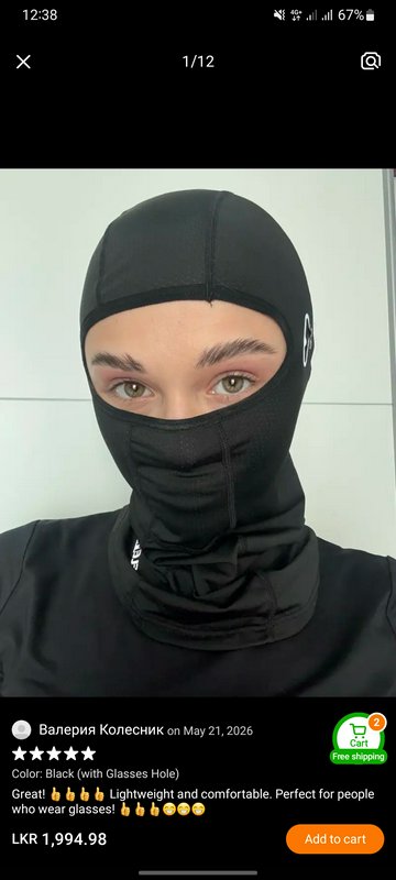 Person modeling a black glasses-compatible balaclava in an e-commerce product review screenshot
