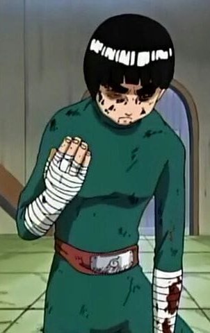 Injured battered Rock Lee holds up his bandaged fist after a brutal ninja battle
