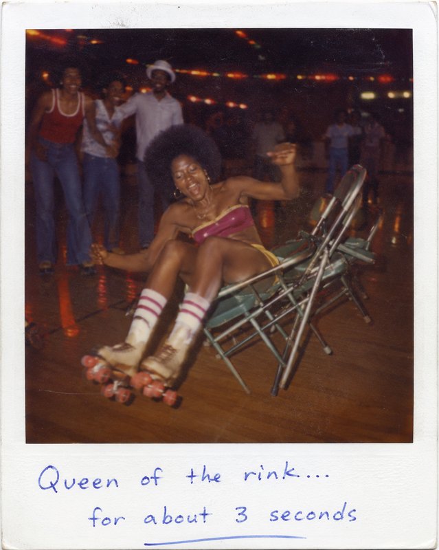 Woman roller-skating on a crowded rink, mid-dance, in a vintage photo.
