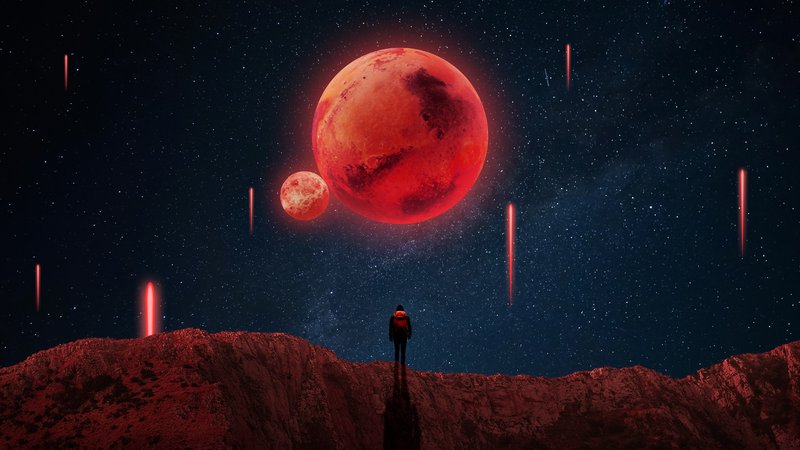 Lone astronaut stands on red alien cliff gazing at glowing red twin planets and falling meteors i...