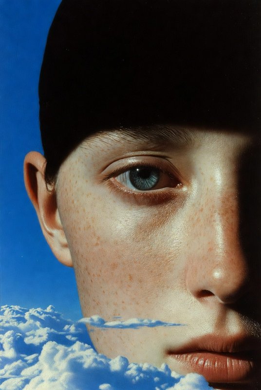 Close-up portrait of a freckled face with blue eye against blue sky and clouds.