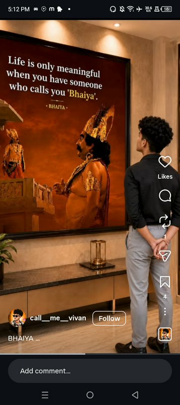 Young man looking at humorous framed wall art featuring a Bhaiya meme quote and Ramayana characters