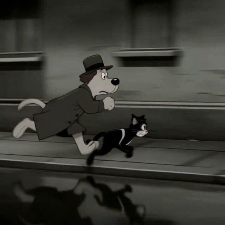 A grayscale cartoon dog in a coat and hat chases a black-and-white cat along a city street.