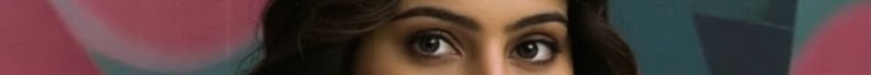 Close-up of a person’s eyes with a graffiti background.