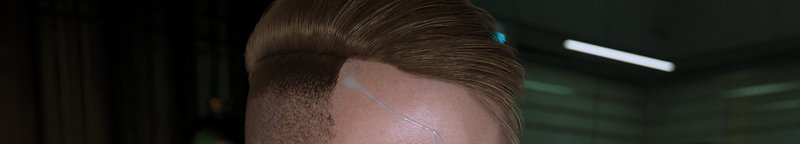 Close-up of an edgy undercut with shaved sides, thick top hair, and a blue accent line.
