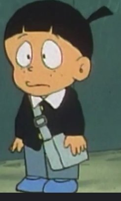 Cartoon child with black hair, white-collar shirt, black sweater, blue shoes, and a crossbody bag...