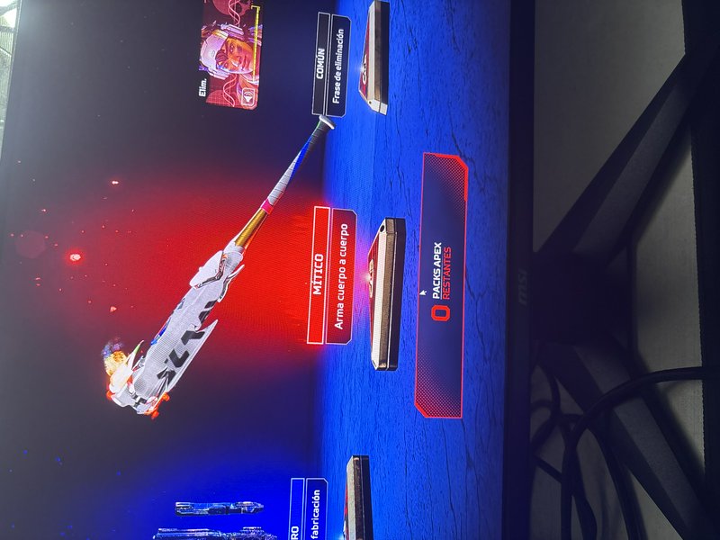 Apex Legends loot screen on a gaming monitor showing a rare mythic tier baseball bat melee weapon...