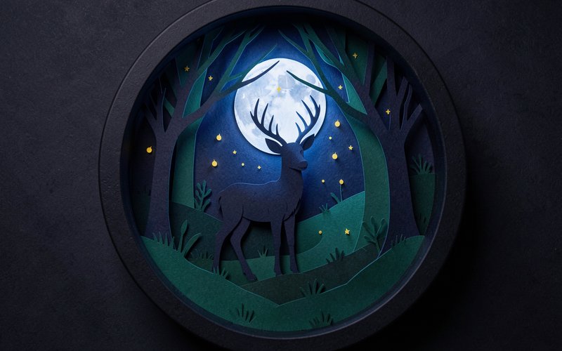 Layered 3D papercut stag standing under a full moon in a night forest shadow box frame