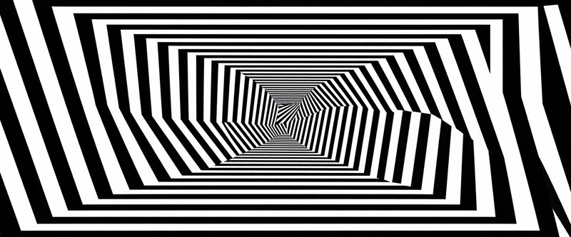 High contrast black and white striped hexagonal tunnel creating a spiraling optical illusion