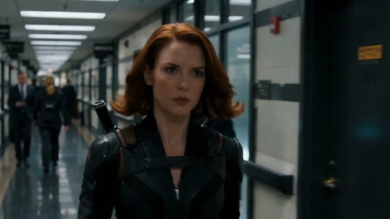 Focused red-haired female spy in a black tactical suit walks purposefully down a busy modern gove...