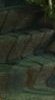 Blurred abstract impressionist artwork with blended earthy brown, soft green, and muted gray wavy...