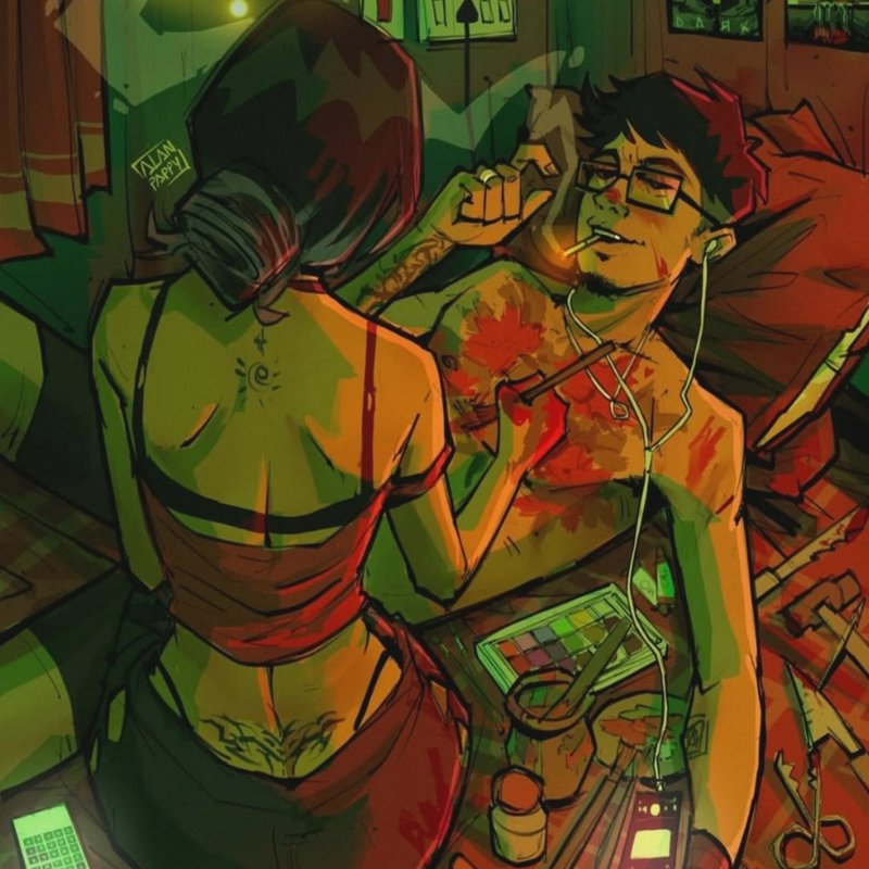 A woman in a red dress applies makeup to a shirtless man with glasses in a neon-lit, cluttered room.