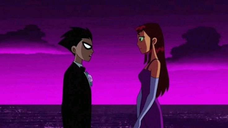 Animated couple in formal attire facing each other at a pink-purple sunset by the water.