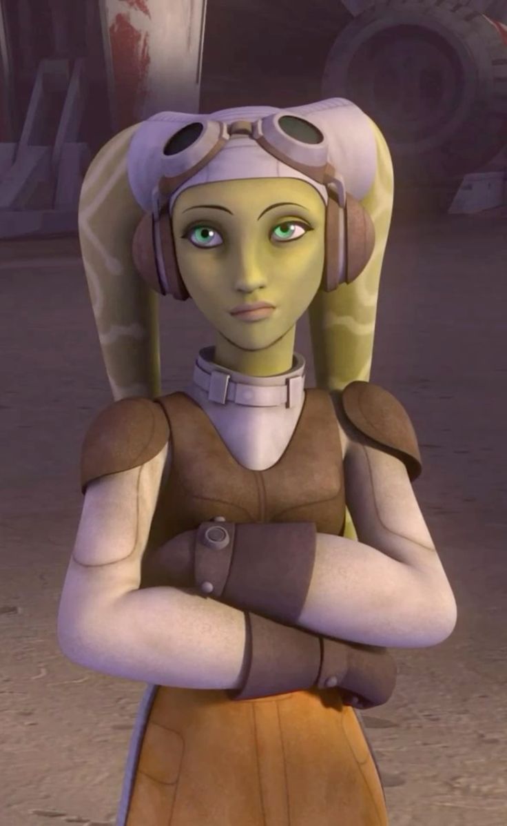 3D-animated female pilot with yellow skin, green eyes, and brown flight suit with goggles.
