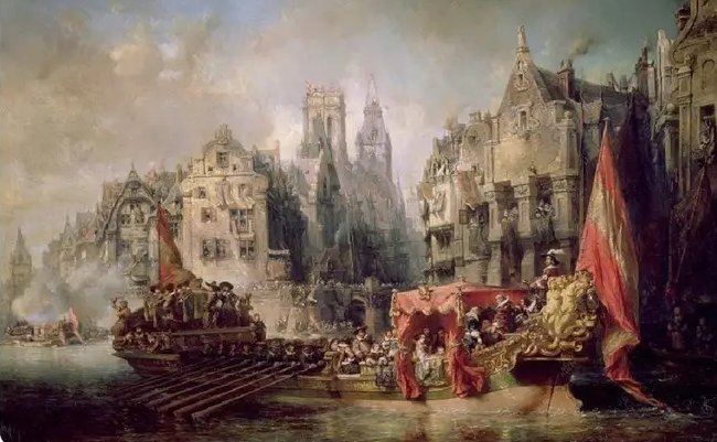 Historical river parade on a canal with ornate barges and a bustling medieval cityscape.