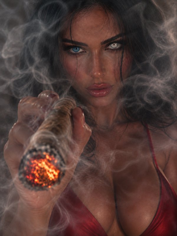 Close-up portrait of a woman with heterochromatic eyes holding a lit smoking cigar, wispy smoke curling around her.