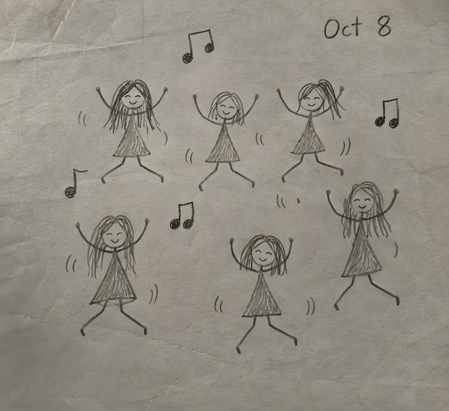 Child's pencil doodle of six smiling dancing stick figures with music notes on crumpled paper dat...