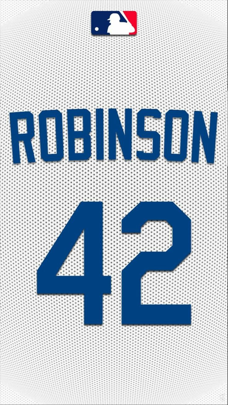 Close-up of a white perforated baseball jersey with blue "ROBINSON" lettering and the number 42, MLB logo at the top.
