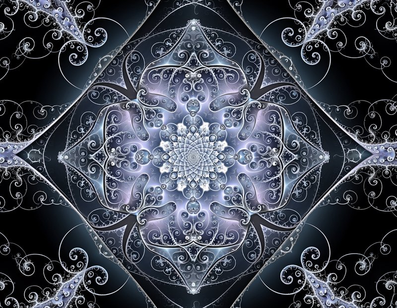 Intricate silver-blue fractal mandala with curling filigree on a dark background