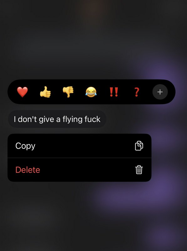 Dark blurred background with a chat bubble saying "I don't give a flying fuck" and a Copy/Delete ...