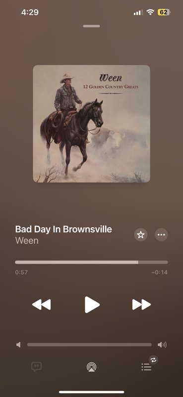 Album cover showing a cowboy on a horse from Ween's "Bad Day In Brownsville" with a brown-tinted ...