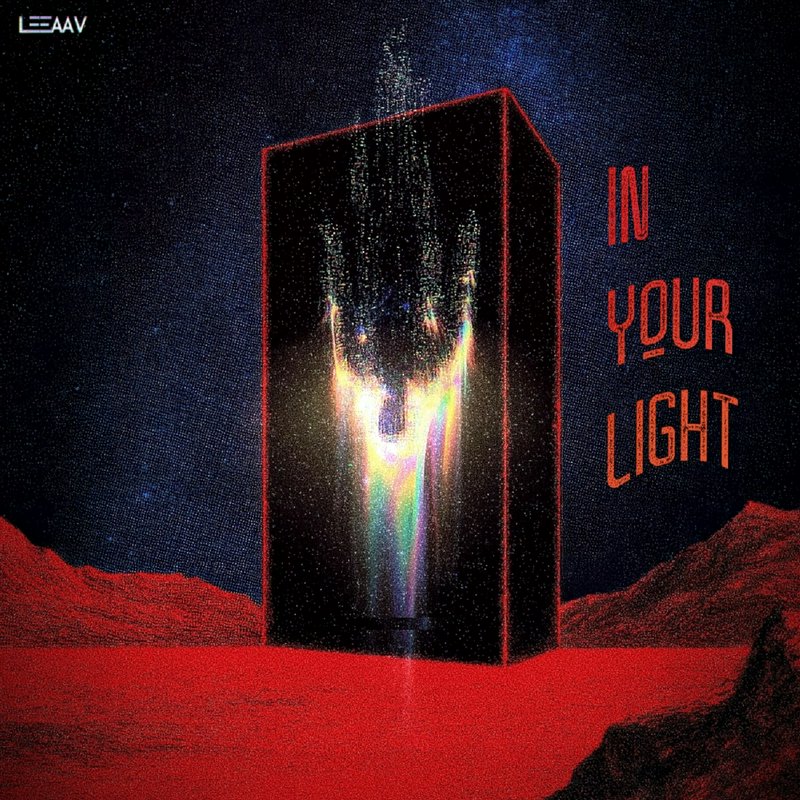 Alien red landscape with a glowing black cube releasing rainbow light and a figure reaching upward.