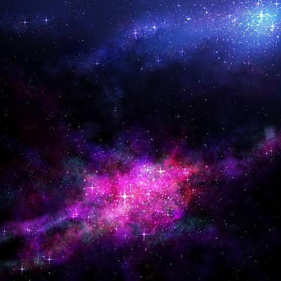Nebula in deep space with pink and purple gas clouds and bright stars.