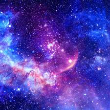 Vibrant blue and purple space nebula with bright stars and a crescent-like emergence.