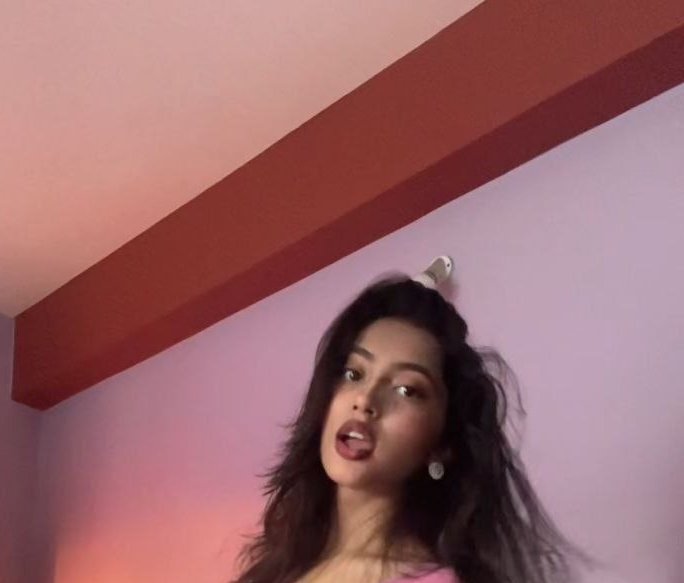 Funny forced perspective optical illusion where a ceiling light appears to be a lightbulb stuck o...