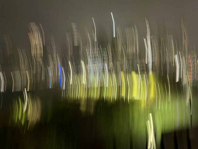 Abstract night city lights created by motion blur and long exposure.