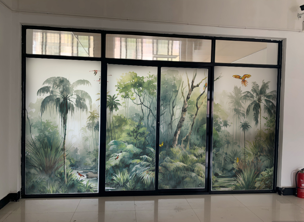 Jungle rainforest mural across frosted glass doors with palm trees and tropical plants