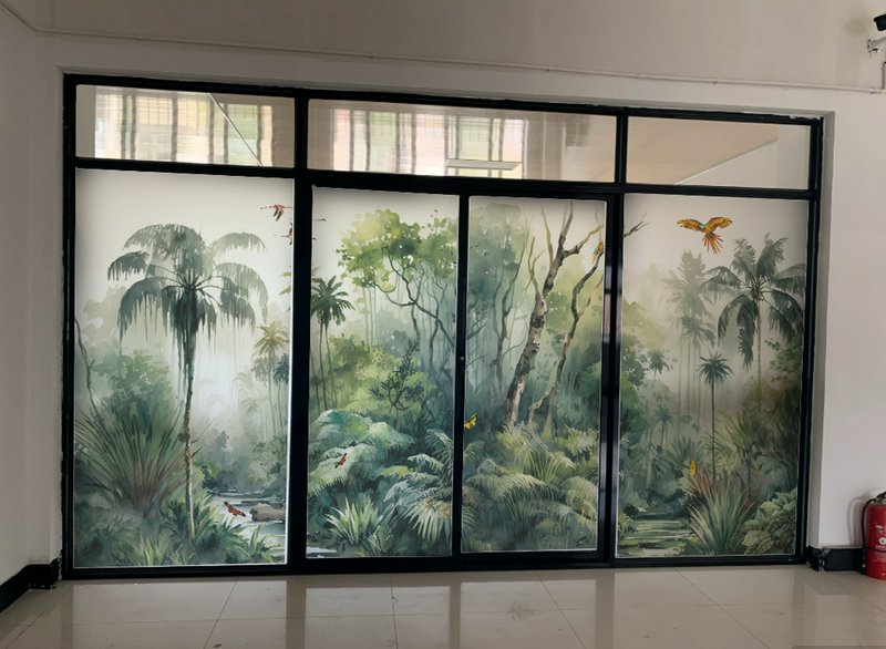 Jungle rainforest mural across frosted glass doors with palm trees and tropical plants