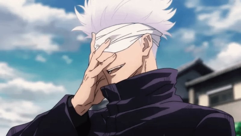 Anime character with white hair and blindfold, smiling, wearing a dark high-collar jacket.