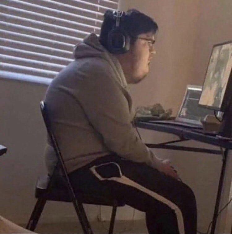 Viral optical illusion making a seated gamer appear to have an impossibly thin compressed torso w...