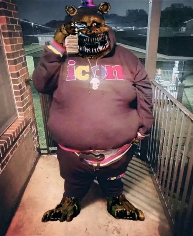 Surreal edited meme of Nightmare Freddy Fazbear in an oversized "icon" hoodie posing on a residen...